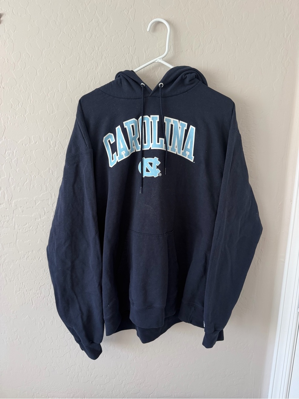 Champion Navy Hoodie with Carolina Arch and Light Blue Logo